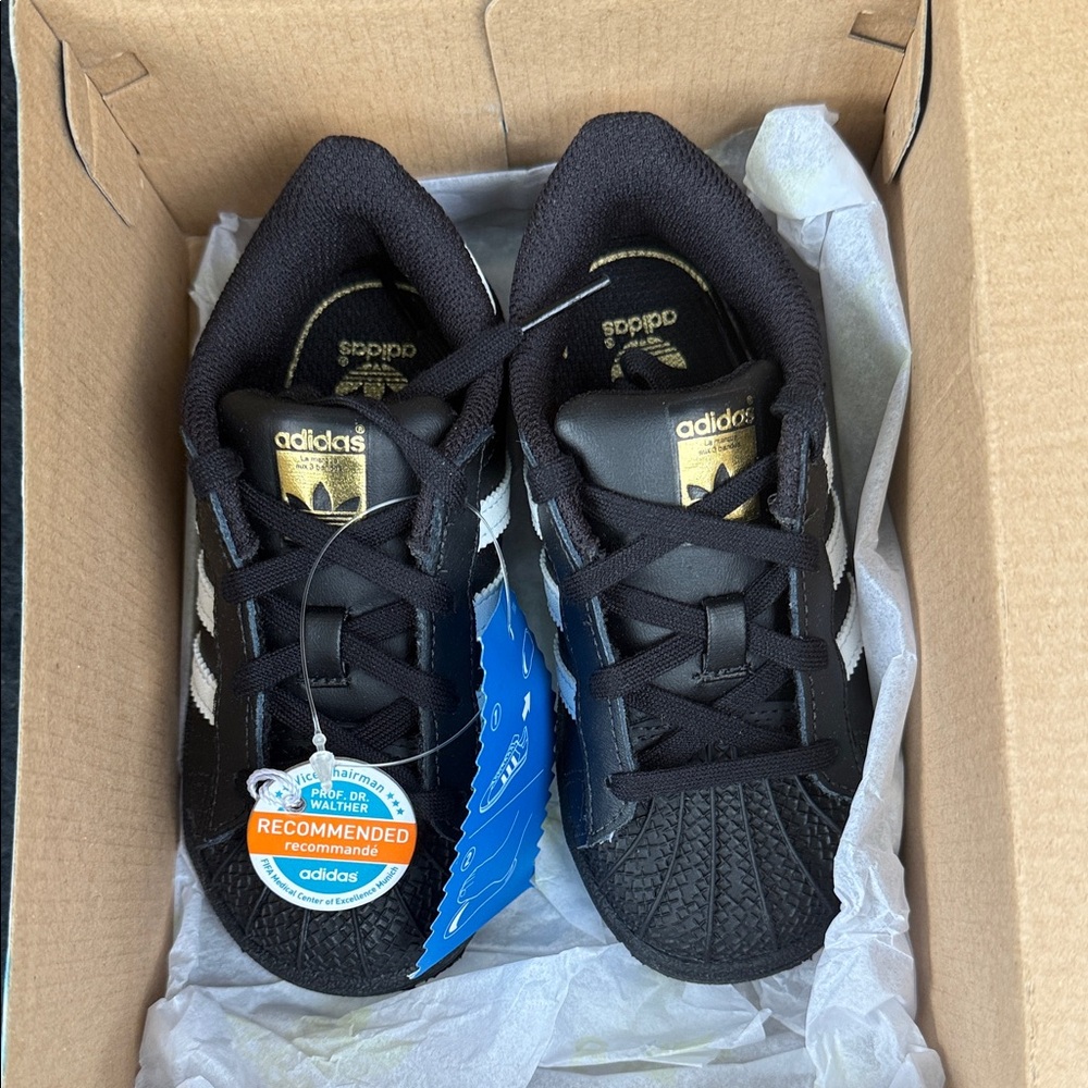 Adidas Black and Gold Sneakers